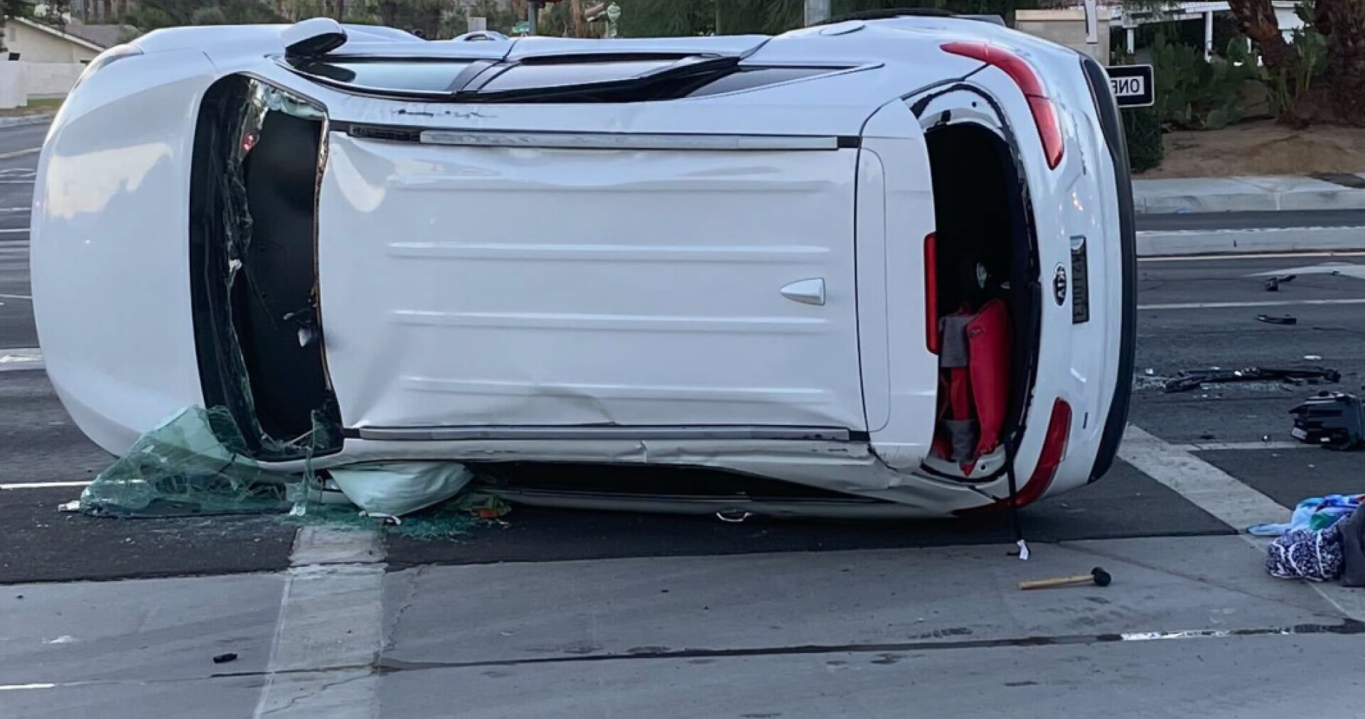 White car rollover the road due to accident, (https://washington.wattelandyork.com/seattle-car-accident-lawyer/)